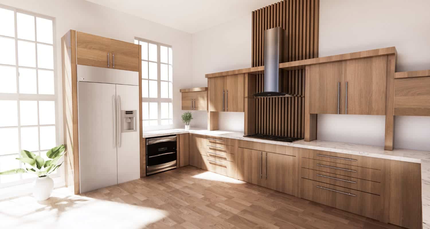 Diseño bioclimático. Cocina ecologica de madera con cristaleras muy grandes y luminosas de una casa sostenible.